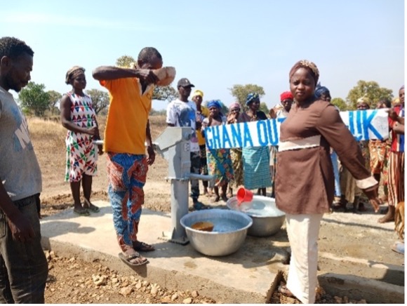 Community members using the new borehole