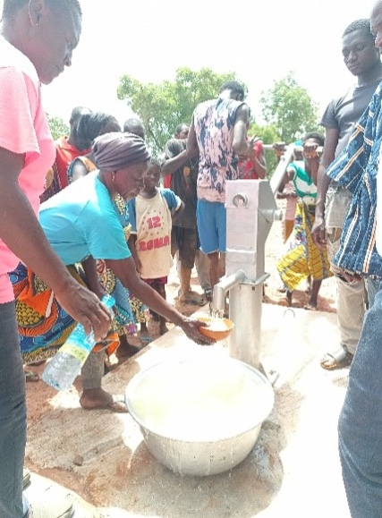 Community members at the new borehole pump