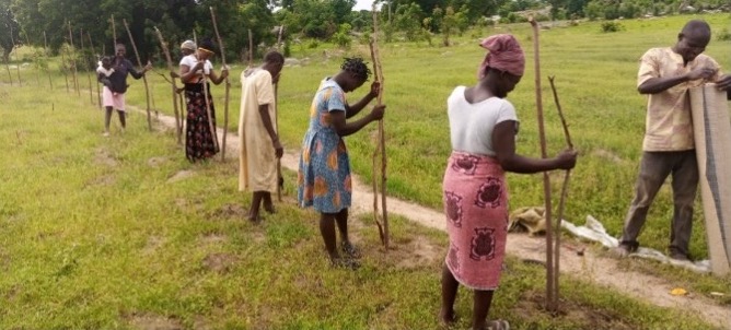Ladies preparing the farm